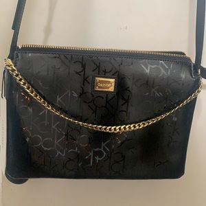 Brand New. Calvin Klein crossbody purse.
